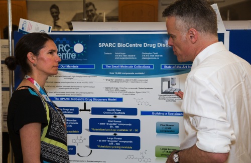 Justin discusses the SPARC small molecule screening facility with Anick Auger